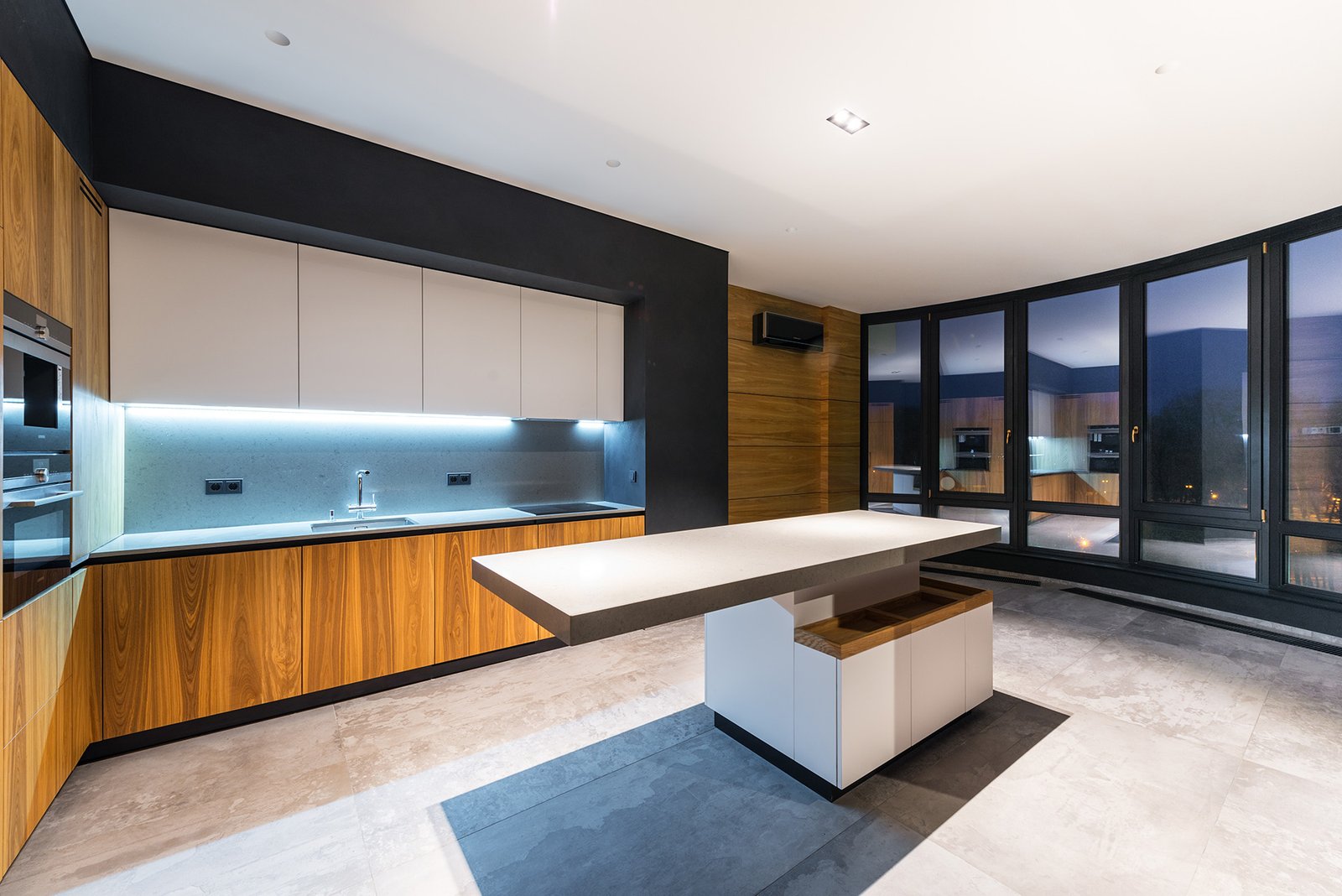 Modern dark luxury kitchen built by Creative Construction 360